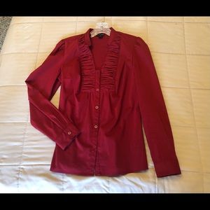 Dark red size small women’s blouse.  Scrunch fabric inlay in front. Back darts.